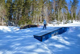 A snowboarder passes by new equipment at the Ski Ben Eoin training park. Nova Scotia Snowboard invested in the local ski hill's training park and was able to purchase new rails and boxes to upgrade the facility. JEREMY FRASER/CAPE BRETON POST