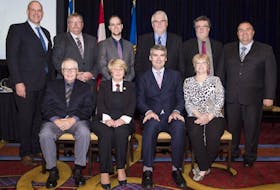 <p>Members of the Nova Scotia Trunked Mobile Radio 2 (TMR2) project were congratulated June 7 on receiving the Premier's Award of Excellence. Pictured here are, from left, back row: Public Service Commission Minister Labi Kousoulis, Scott Hawkes, Matthew Boyle, Todd Brown, Deputy Minister Jeffrey Conrad, and Paul Maynard; front row: Tom Conrad, Suzan MacLean, Premier Stephen McNeil, and Marion Pye.</p>