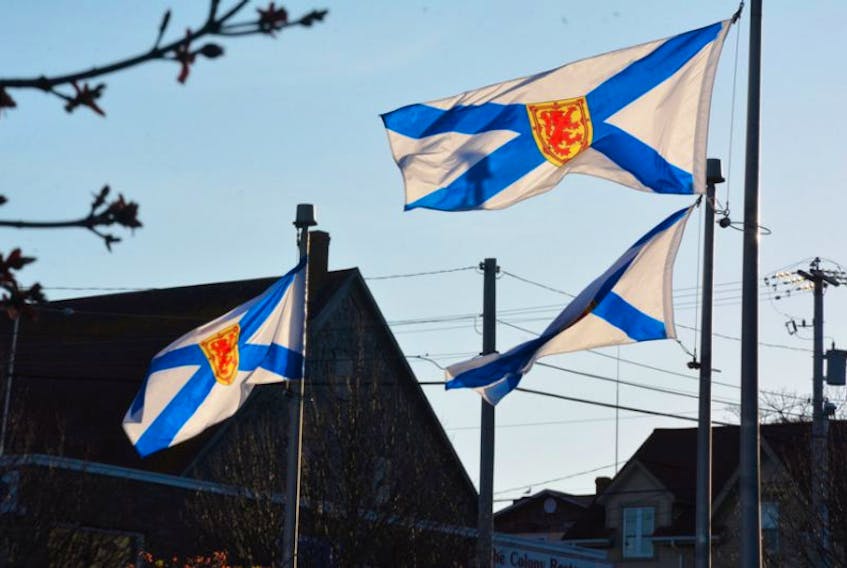 Nova Scotia flags flap in the wind. TINA COMEAU PHOTO