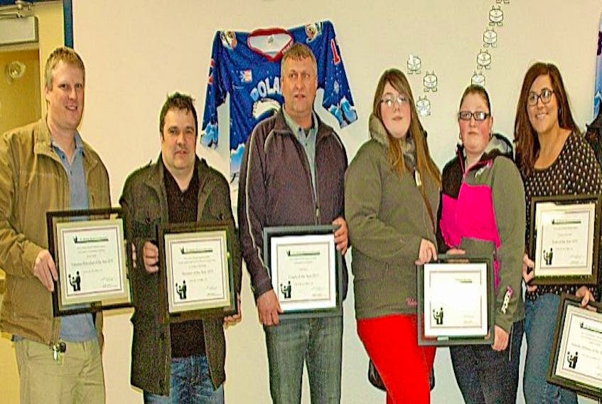Recipients of the 2015 St. Anthony Recreation Advisory Committee Awards were, from left, Volunteer of the Year Kerry Decker (accepted by Scott Coish), Sponsor of the Year St. Anthony Cold Storage (accepted by Jim Gibbons), Coach of the Year Todd Taylor, Male Athlete of the Year Adrian Ward (accepted by sisters Valerie and Chanda Ward), Female Athlete of the Year Angela Cronhelm and Team of Year the Team Dolphins Swim Team (both accepted by Krista Lynn Howell).