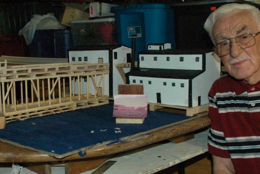 Francis Patey, 81, of St. Anthony is working on building a replica of the old A.H. Murray and Company Limited wharf.