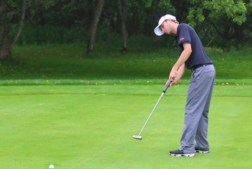 <p>Austin Connelly putts on the 16th green at Clare Golf and Country Club.</p>