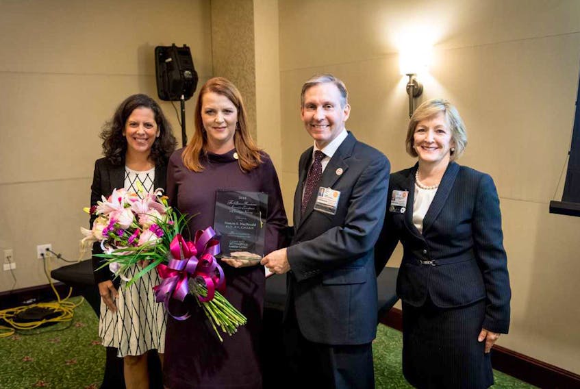 Fairmont, Antigonish County native Frances MacDonald accepting the 2018 Brown Foundation Award for Excellence in Oncology Nursing at the University of Texas MD Anderson Cancer Centre, from Brown Foundation Representative Isabel Stude Lummis (left), MacDonald, President of MD Anderson Cancer Center Dr. Peter Pisters and Chief Nursing Officer Dr. Carol Porter. Contributed
