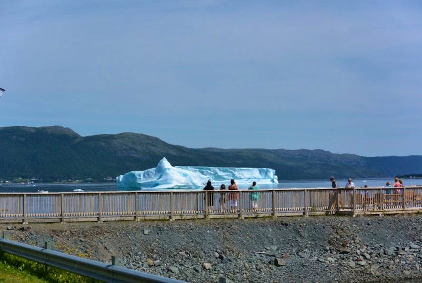 ['Usually visitors bypass King’s Point, taking the bumpy ride to Jackson’s Cove and Harry’s Harbour to view the icebergs. Not this year, said these onlookers.']