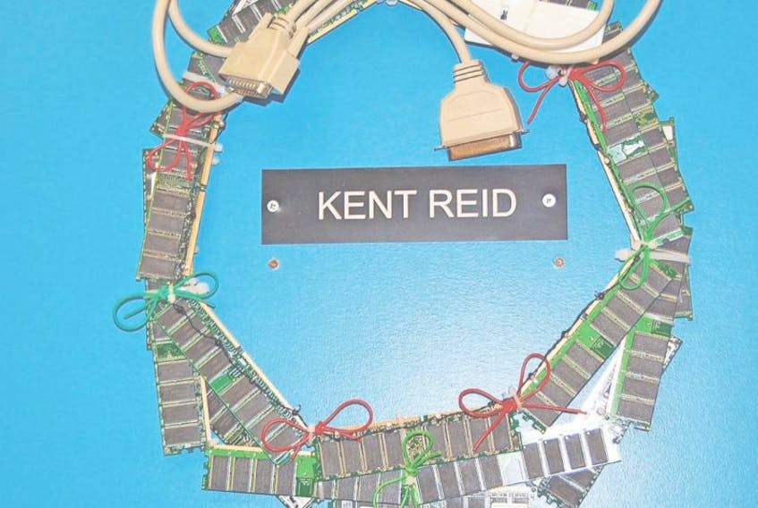 Kent Reid came across a design of a wreath online and made one for his office door at Indian River Academy. Known as the “tech guy,” Reid said he decided to get creative and have a little fun with scrap parts he had around his office. “I think it has enough nerd cred to pass,” he quipped.