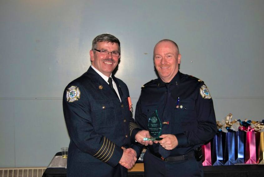 Lt. Peter Hillier was presented the Roy Manual Firefighter of the Year Award by Fire Chief Rennie Normore.