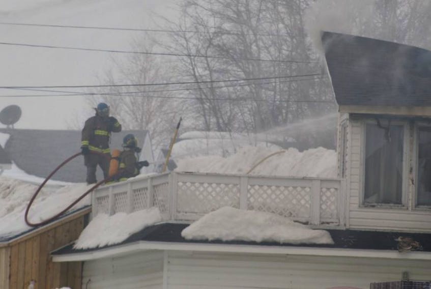 Baie Verte Fire Department members battle the fire at Baie Verte Manor.