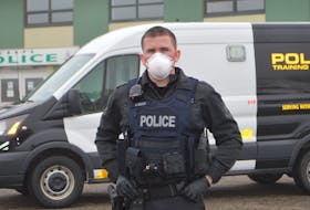 Const. Donnie MacKay, a training officer with the Cape Breton Regional Police Service, stands outside the East Division detachment in Glace Bay earlier this month in protective equipment officers carry now due to the COVID-19 pandemic. Sharon Montgomery-Dupe/Cape Breton Post


