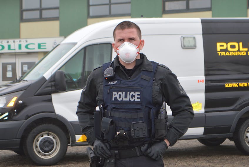 Const. Donnie MacKay, a training officer with the Cape Breton Regional Police Service, stands outside the East Division detachment in Glace Bay earlier this month in protective equipment officers carry now due to the COVID-19 pandemic. Sharon Montgomery-Dupe/Cape Breton Post


