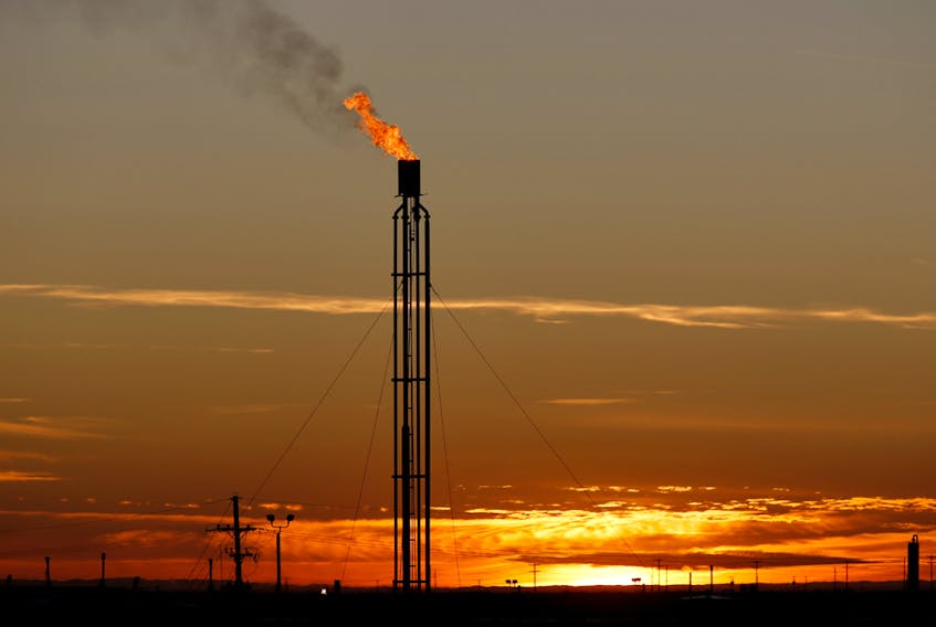 A flare burns excess natural gas in the Permian Basin in Loving County, Texas.