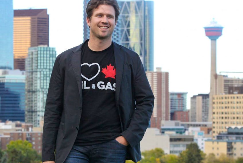 The man behind the "I Heart Canadian Oil &amp; Gas" t-shirts, Cody Battershill, poses for a photo in the cities SW. Sunday, September 22, 2019. Brendan Miller/Postmedia