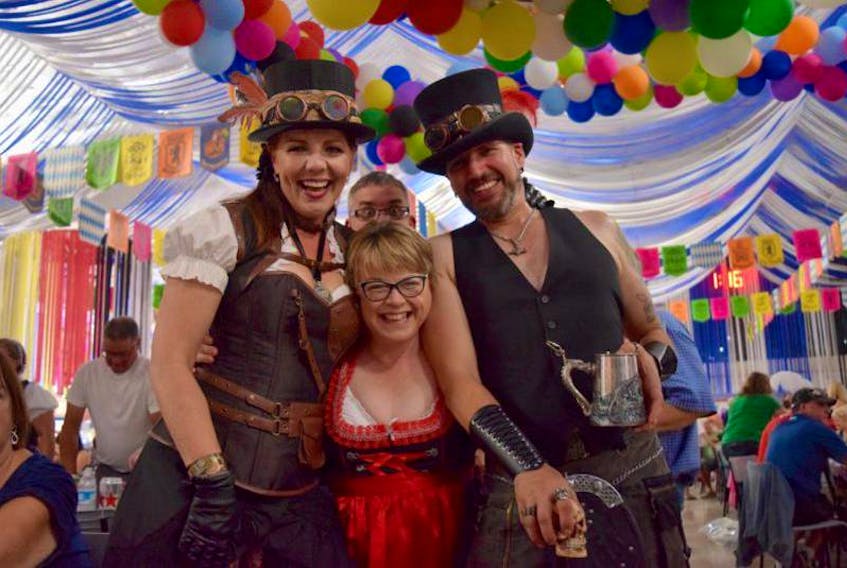 Melinda denHamm (left) and Theo denHamm (right) blended traditional Bavarian outfits with a steampunk theme at last year’s Tatamagouche Oktoberfest. They were joined their friend Tracy Forbes, who travels from Alberta each year to attend.