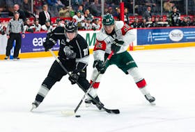 Halifax Mooseheads defenceman Olivier Desroches, right, and Gatineau Olympiques forward Pier-Olivier Roy battle for the puck during a Jan. 23 QMJHL game at the Scotiabank Centre. (QMJHL)