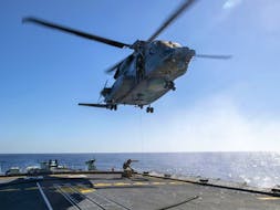 The Cyclone helicopter that crashed off the coast of Greece on April 29 is shown in this Feb. 15 photo operating from HMCS Frederiction. Six Canadian Forces members died in the crash. Photo by Cpl. Simon Arcand.