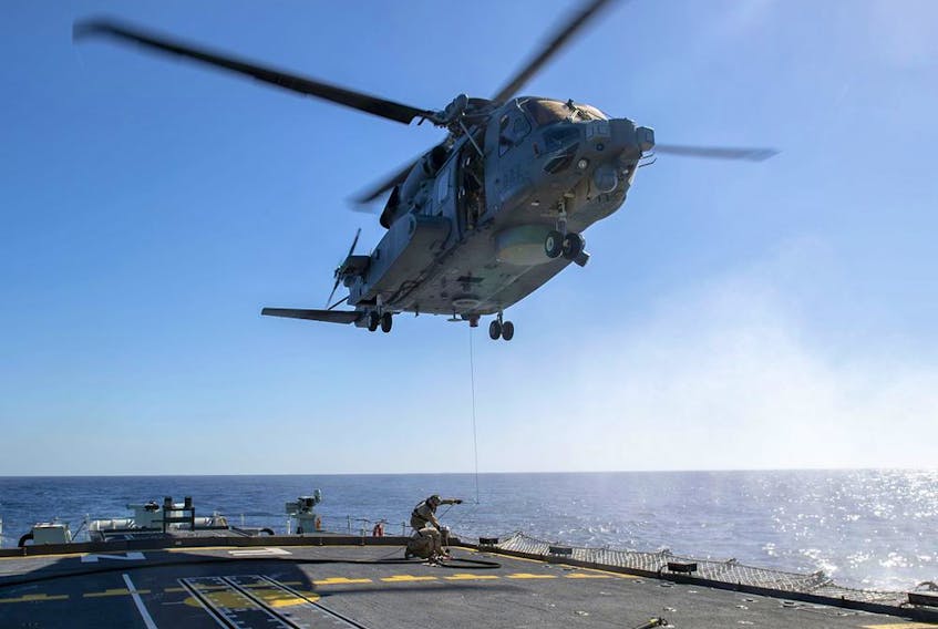 The Cyclone helicopter that crashed off the coast of Greece on April 29 is shown in this Feb. 15 photo operating from HMCS Frederiction. Six Canadian Forces members died in the crash. Photo by Cpl. Simon Arcand.