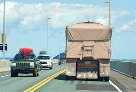 Traffic travels across the Confederation Bridge in this July 2019 file photo. 