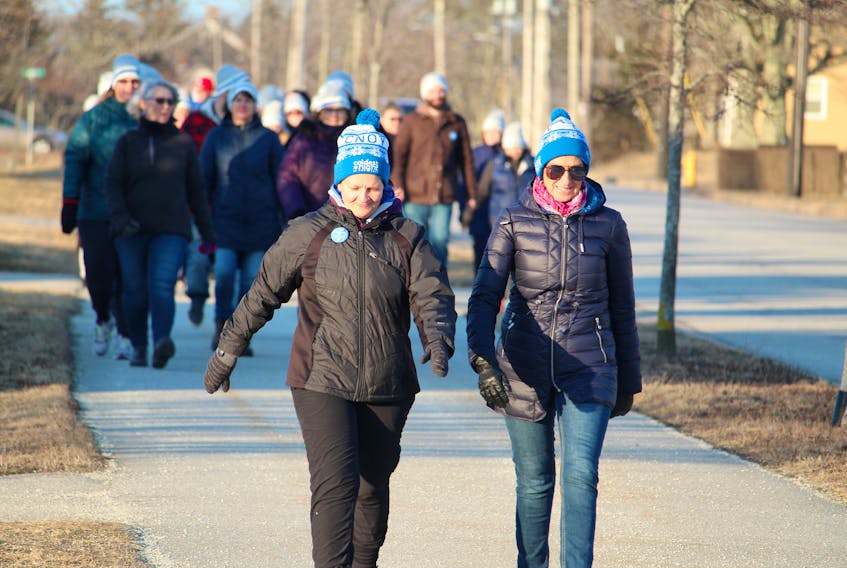 Participants in the Coldest Night of the Year walk in Yarmouth leave NSCC Burridge Campus at the start of the Feb. 22 event. ERIC BOURQUE
