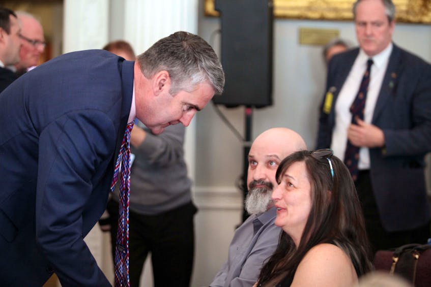 Premier Stephen McNeil speaks to organ recipient Cindy Ryan at Province House on Tuesday after he announced changes to organ and tissue legislation. Ryan has received two liver transplants since 2013 after she contracted a virus that attacked her liver. - Eric Wynne