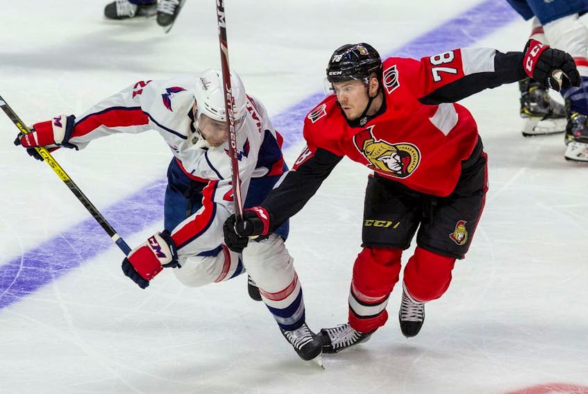 FILES: Ottawa Senators Filip Chlapik battles with Washington Capitals Garnet Hathaway during NHL action at the Canadian Tire Centre in Ottawa on Friday January 31, 2020.