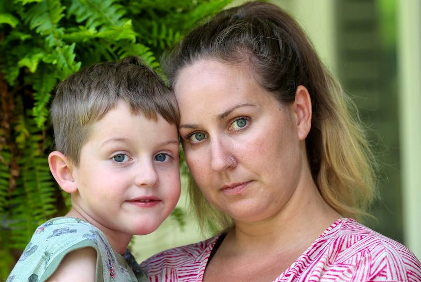  Mandy Green and her son Chase pose outside their Kemptville home on July 31. Chase suffered from second stage Lyme Disease and bacterial meningitis.