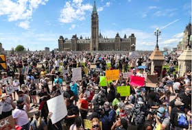 Thousands of people gathered to join a Black Lives Matter protest and a support march for march for George Floyd in downtown Ottawa Friday June 5, 2020.   