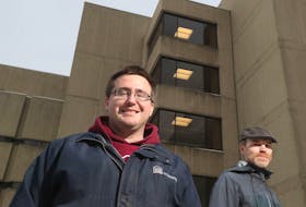 Patrick D'Aoust and Dr. Tyson Graber pose for a photo at the University of Ottawa campus on Friday.