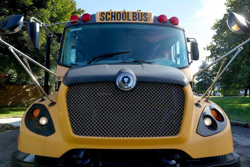 OTTAWA -  School bus outside École Horizon-Jeunesse in Ottawa Thursday Sept 3, 2020. 