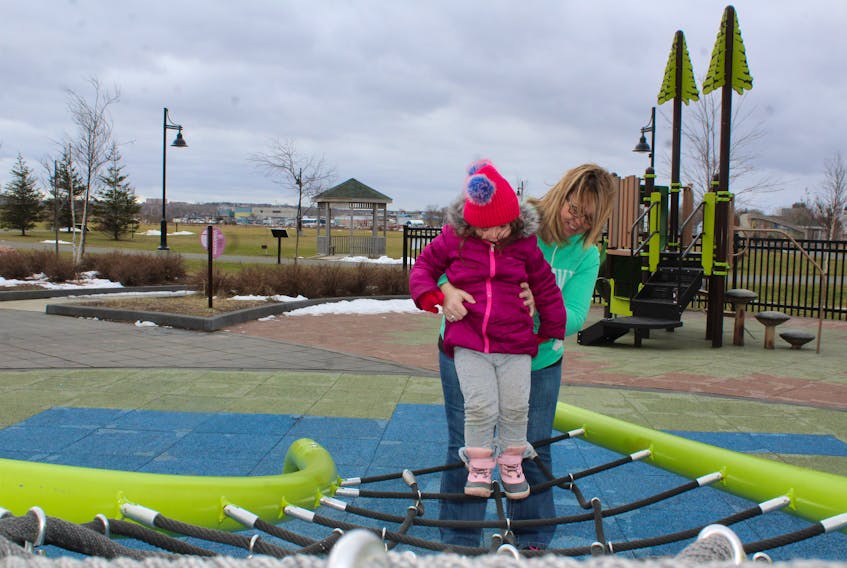 Outdoor parks and recreation areas were surprisingly busy this week across the Cape Breton Regional Municipality. At the Open Hearth Park in Sydney, the playground and walking trails were being used by young and old alike, including Paula Brandon and her granddaughter Peyton Brandon. The rope activity area was part of their playdate. Flurries and below zero temperatures are in the forecast for the rest of the week. GREG MCNEIL • CAPE BRETON POST