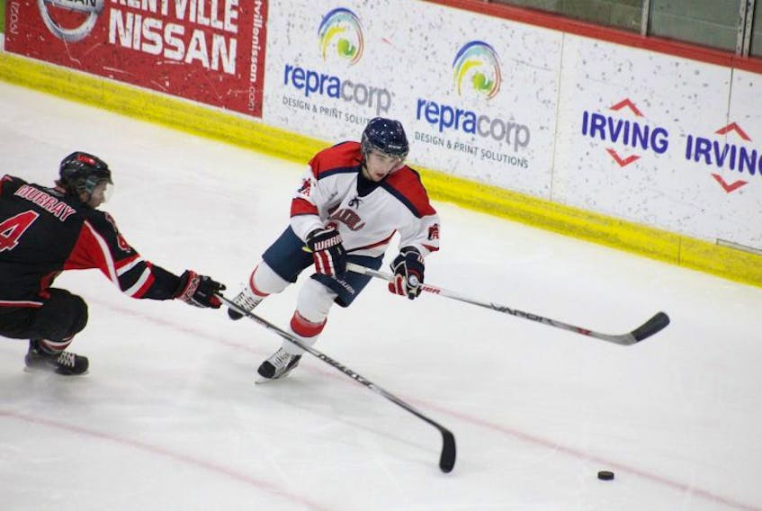 Acadia rookie forward Kyle Farrell, right, had back-to-back winning goals in overtime as the Axemen swept a weekend series from UNB and UPEI for the second time this season, this time on home ice. Farrell scored at 3:32 of overtime to give Acadia a 4-3 win over UNB Nov. 13, then scored 18 seconds into overtime Nov. 14 to give the Axemen a wild 6-5 win over UPEI. Farrell has now scored four overtime winning goals in his first 11 regular season games.  