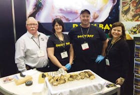 <p>More than a dozen P.E.I. companies attended one of the biggest annual international seafood expos recently. From left, are Paul Runighan, sales with P.E.I. Mussel King, Whitney Hooper, Raspberry Point Oysters, James Power, Raspberry Point Oysters, and Bonnie Macdonald, Innovation P.E.I.</p>