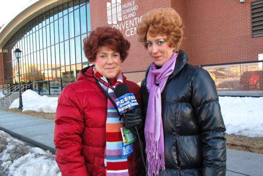 This Hours Has 22 Minutes cast members Cathy Jones, left, and Susan Kent get ready for a shoot outside the P.E.I. Convention Centre during a recent visit to the province.
