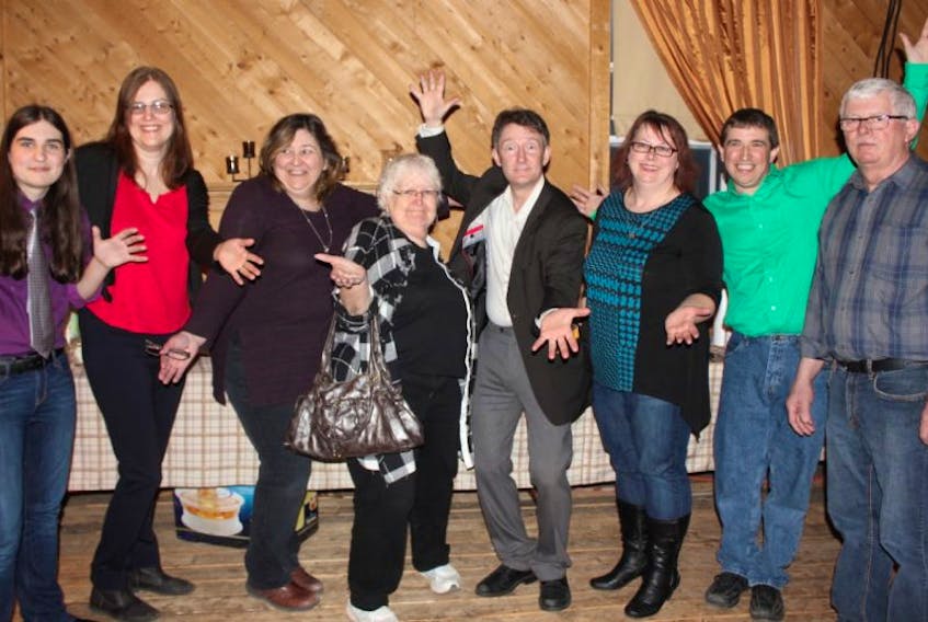 Voice committee members spoof it up with guest Pete Soucy, Volunteer Week Honorary Chair, and emcee Paul Penney. From left are Kayla Penney, Jackie Penney, Edith Samson, Diane Thorpe, Pete Soucy, Peggy White, Paul Penney and Barry Pearce. Other committee members are Mark Aylward, Kayla Hobbs and Jim Miller.