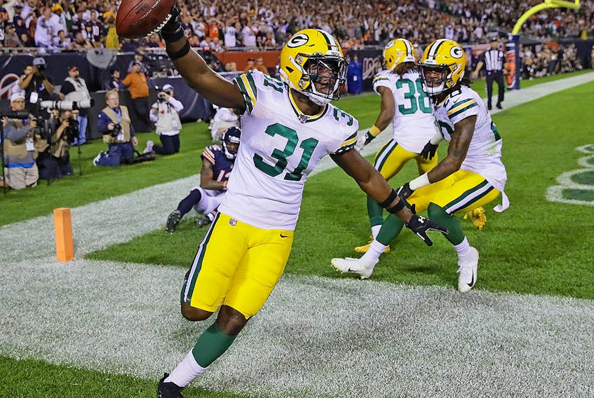  Adrian Amos of the Green Bay Packers celebrates after intercepting a pass in the end zone at Soldier Field on September 5, 2019 in Chicago.