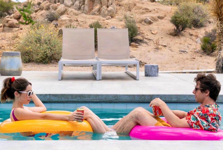 Relaxing with an Akupara: Cristin Milioti and Andy Samberg in Palm Springs.