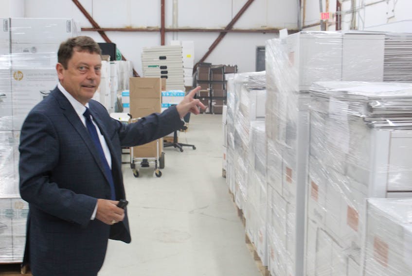 Chief electoral officer Bruce Chaulk shows off one of the warehouses containing election materials ready to go at the Elections NL offices. He says the office has to be prepared for an election at any moment, largely due to the minority government.