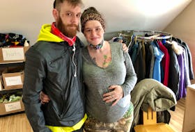 Zachary Landry, left, and his fiancée Mary Pellerin inside the Ally Centre's Comfort Centre on March 12, where they often go to access support and help as they rebuild their lives from homelessness in preparation for their son's arrival in April. Landy panhandles to keep healthy food on the table for his soon-to-be wife and son. NICOLE SULLIVAN/CAPE BRETON POST 