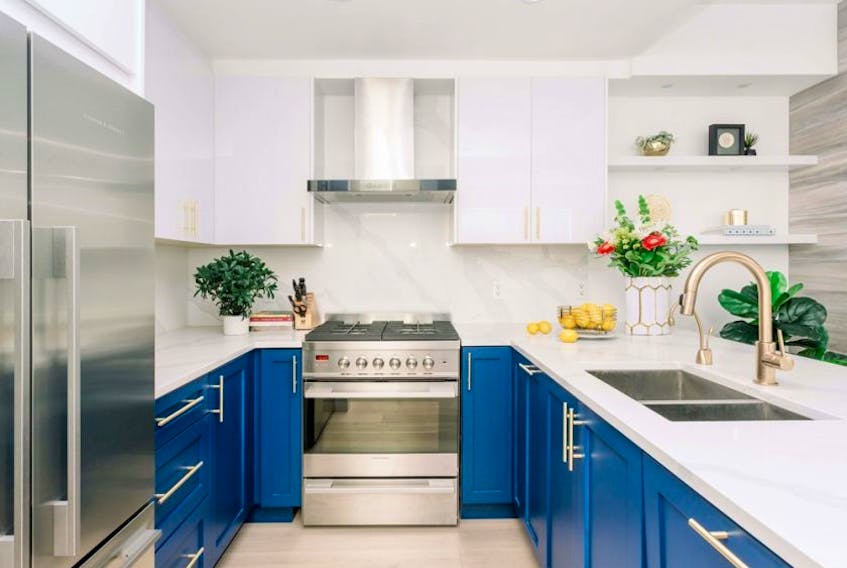 Pantone’s colour of the year, Classic Blue, is highlighted in this kitchen by Sarah Gallop Design Inc.