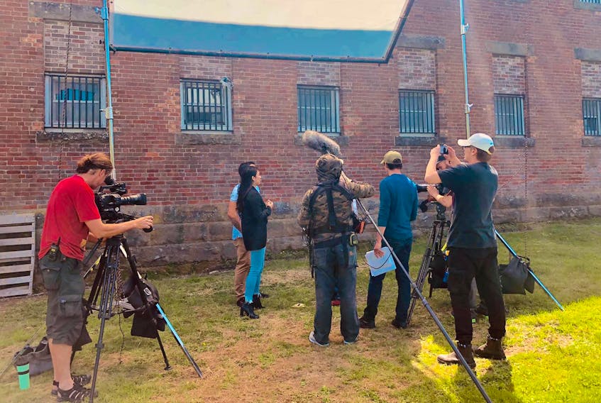 The cast and crew of The Other Side film a segment of their documentary series at the Dorchester jail during a visit to the site for three days in early July.