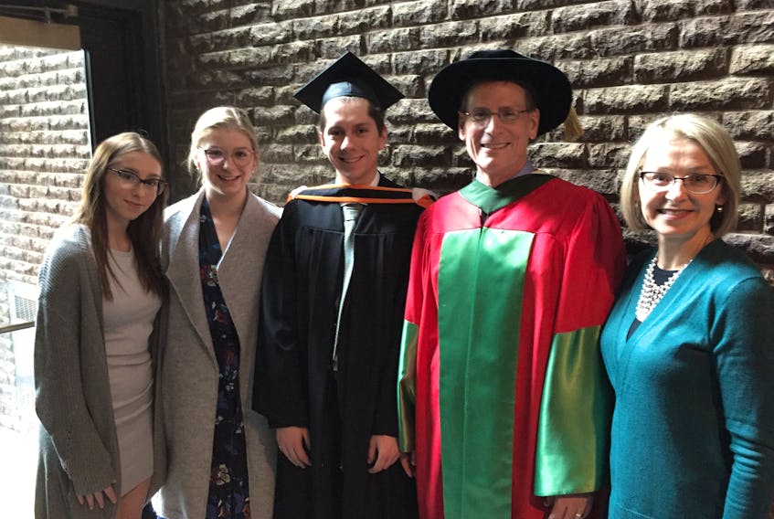 The Naterer family — (from left) Veronica, Julia and Jordan, their father, Greg, Memorial University's dean of engineering, and their mother, Josie — celebrate Jordan’s graduation from MUN's faculty of engineering in this 2018 photo. Jordan has been missing in British Columbia since Oct. 10 and his family is frantically trying to find him. – CONTRIBUTED