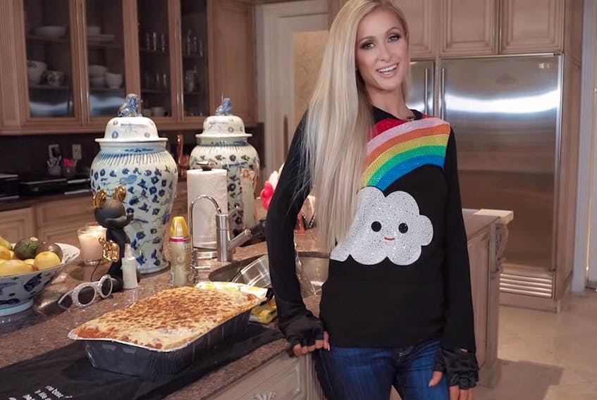"I guess it is a lot of steps, comparing it to toast or something," Paris Hilton says of making lasagna. 