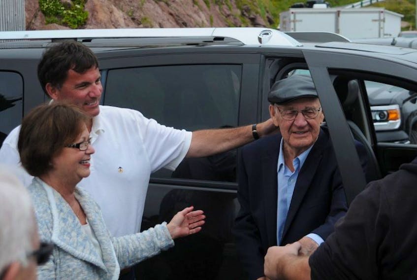 <p>Bonavista-Burin-Trinity MP Judy Foote, left, and federal Fisheries Minister Dominc LeBlanc greet Quinlan Brothers president and co-founder Pat Quinlan, who joined them in Bay de Verde Monday for an announcement about funding this year for small craft harbours.</p>