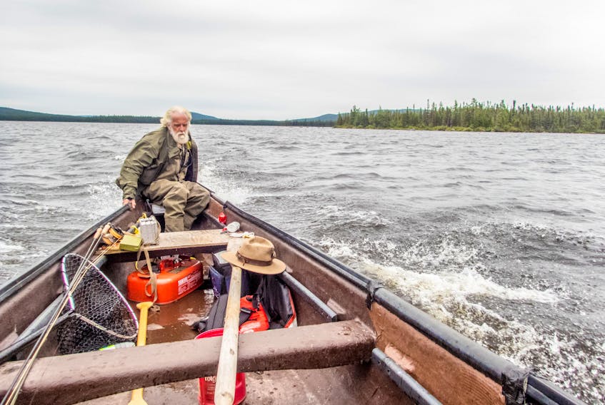 There's Perry Munro in his element. Doesn’t he look the part — the quintessential  fishing guide look. – Paul Smith photo
