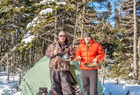 I see at least two so called single-use plastic bags in this photo. Robert and Cameron are my winter camping buddies. — Paul Smith photo

