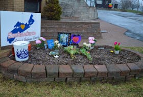 A memorial to three of the victims of last week’s mass shooting has been erected at the Sydney Memorial Chapel on the corner of Welton Sand Gorman streets. The oval-shaped flower bed, which includes pictures, flowers, written tributes and a Nova Scotia Strong map, pays tribute to Jolene Oliver, her husband Aaron Tuck and their daughter Emily, 17, who were among the tragedy’s 22 fatalities. The Tuck family moved to Portapique about two years ago after living in Sydney for a number of years. Similar memorials have popped up around Nova Scotia, especially at or near the some 17 crime scenes associated with the mass shooting. DAVID JALA/CAPE BRETON POST