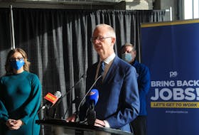 Progressive Conservative Leader Ches Crosbie highlighted his party's job creation plan during a news conference Monday in St. John's. Standing near Crosbie are St. John's West candidate Kristina Ennis and Conception Bay East-Bell Island candidate David Brazil. — Andrew Robinson/The Telegram
