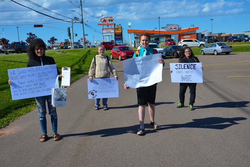 A little over 20 people participated in the Allies Against Racism and Discrimination rally in Summerside on Tuesday, June 9. The participants marched from Cannabis P.E.I. to Summerside City Hall. Participants included, from left, Melodie Jordan of Miscouche, Emily Wall of Lot 16, organizer Andrew Morrison of Summerside and Giselle Jordan of Miscouche. This is the second protest against racism and discrimination to take on P.E.I. in a week. Charlottetown Police Services estimated between 8,000 and 10,000 people took part in a Black Lives Matter march in Charlottetown on Friday night.