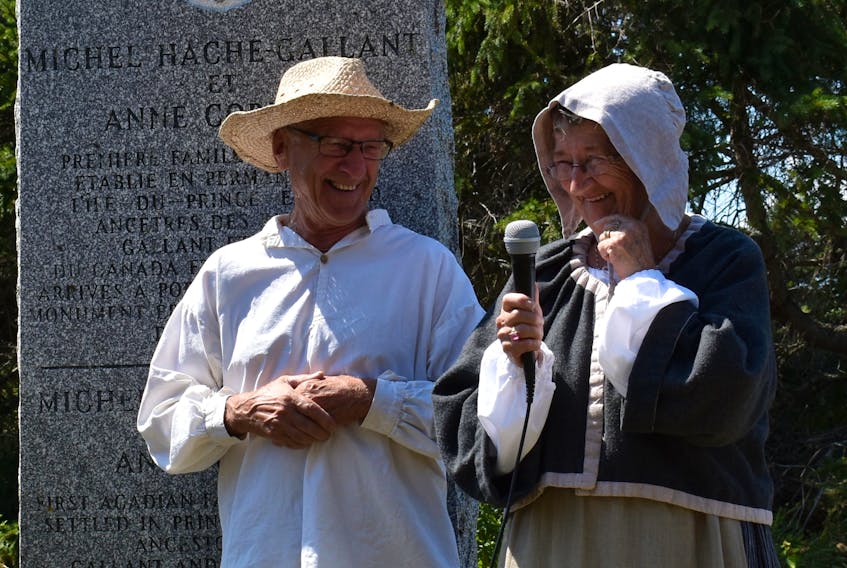 Clem Gallant and Yvonne Doucette acting as Michel Haché-Gallant and Anne Cormier, the first Acadian settlers on P.E.I. They both laugh as Doucette tries to remember the names of all the Haché-Gallant children.