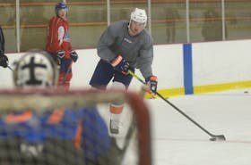 Ross Johnston prepares to fire a shot on goal during a recent skate at MacLauchlan Arena.