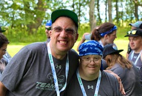 Aaron Myers, left, and Team P.E.I. softball teammate Chris MacPherson at the 2018 Special Olympics Canada National Summer Games.