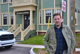 Steve Murphy, president of the Cavendish Beach Tourism Inc., plans to open his restaurant, Blue Mussel Café, in Rustico despite the very real possibility of operating at a loss over the summer. His other restaurant, Slaymaker and Nichols, shown behind him in Charlottetown, has been open for take-up orders since the pandemic began.